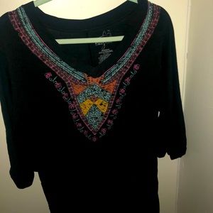 Black shirt with design along the neckline